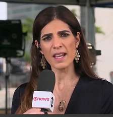 Andréia Sadi na cobertura especial da sessão do STF ao vivo de Brasília: boa parte do Brasil parou diante da TV Foto: Reprodução/TV